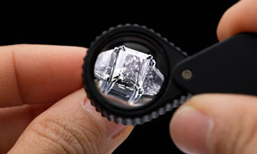 diamond ring viewed through loup