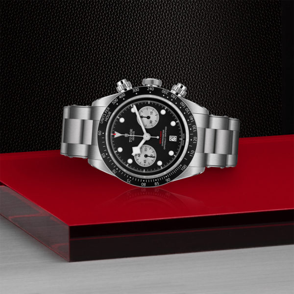TUDOR Black Bay Pro Watch with a 41mm Steel Case, Steel Brace (M79360N-0001)Laying Down on Red Tray