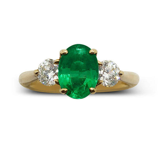 One of a Kind Three Stone Emerald Ring