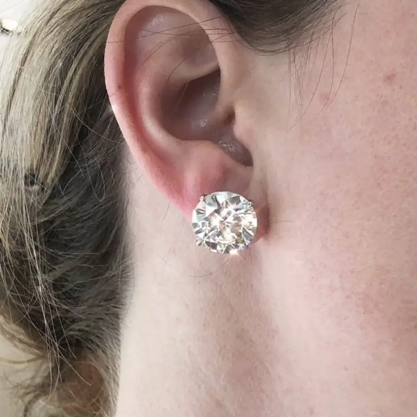 diamond stud earring on model's ear