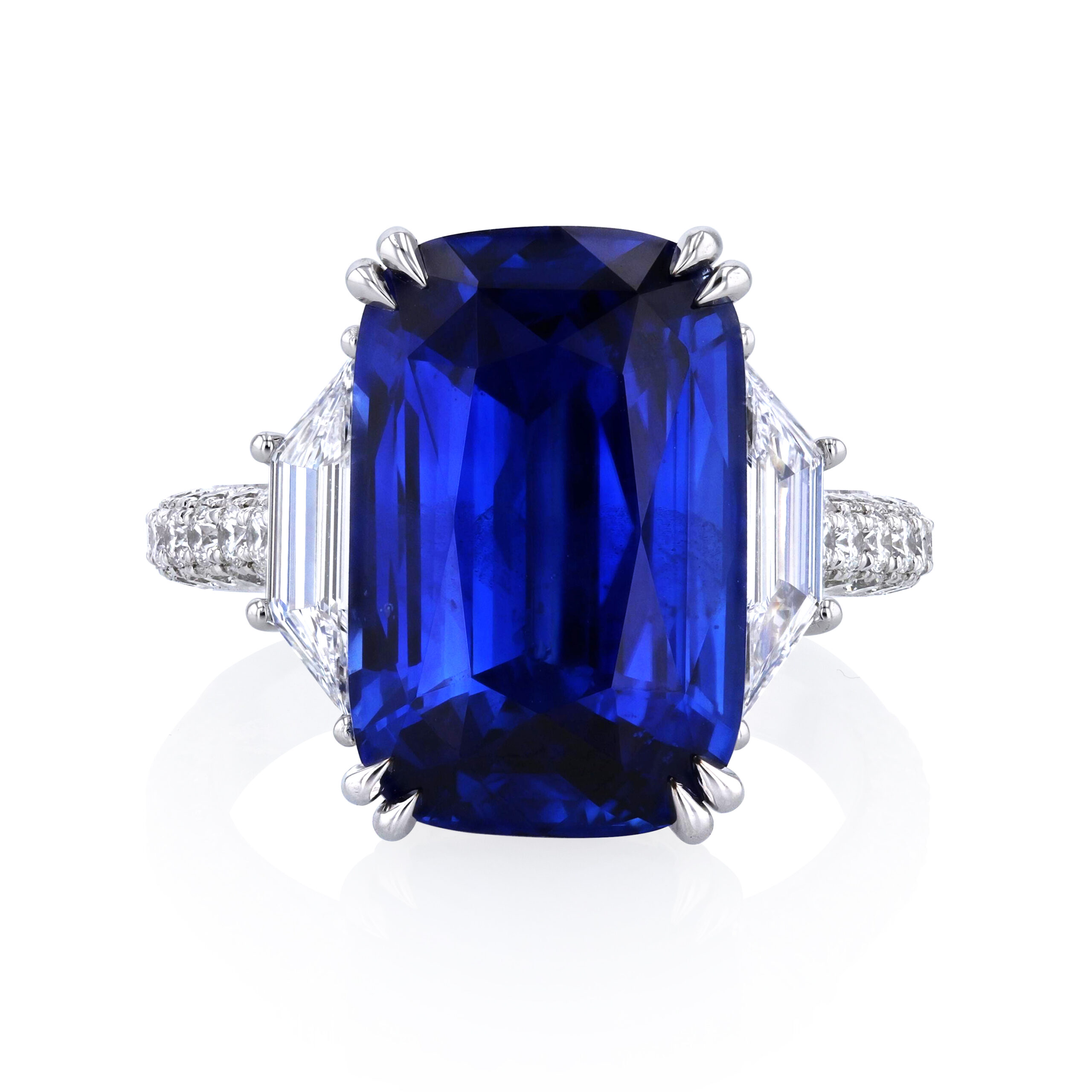 Elongated cushion cut blue sapphire and diamond three-stone ring in platinum – Underwood Jewelers