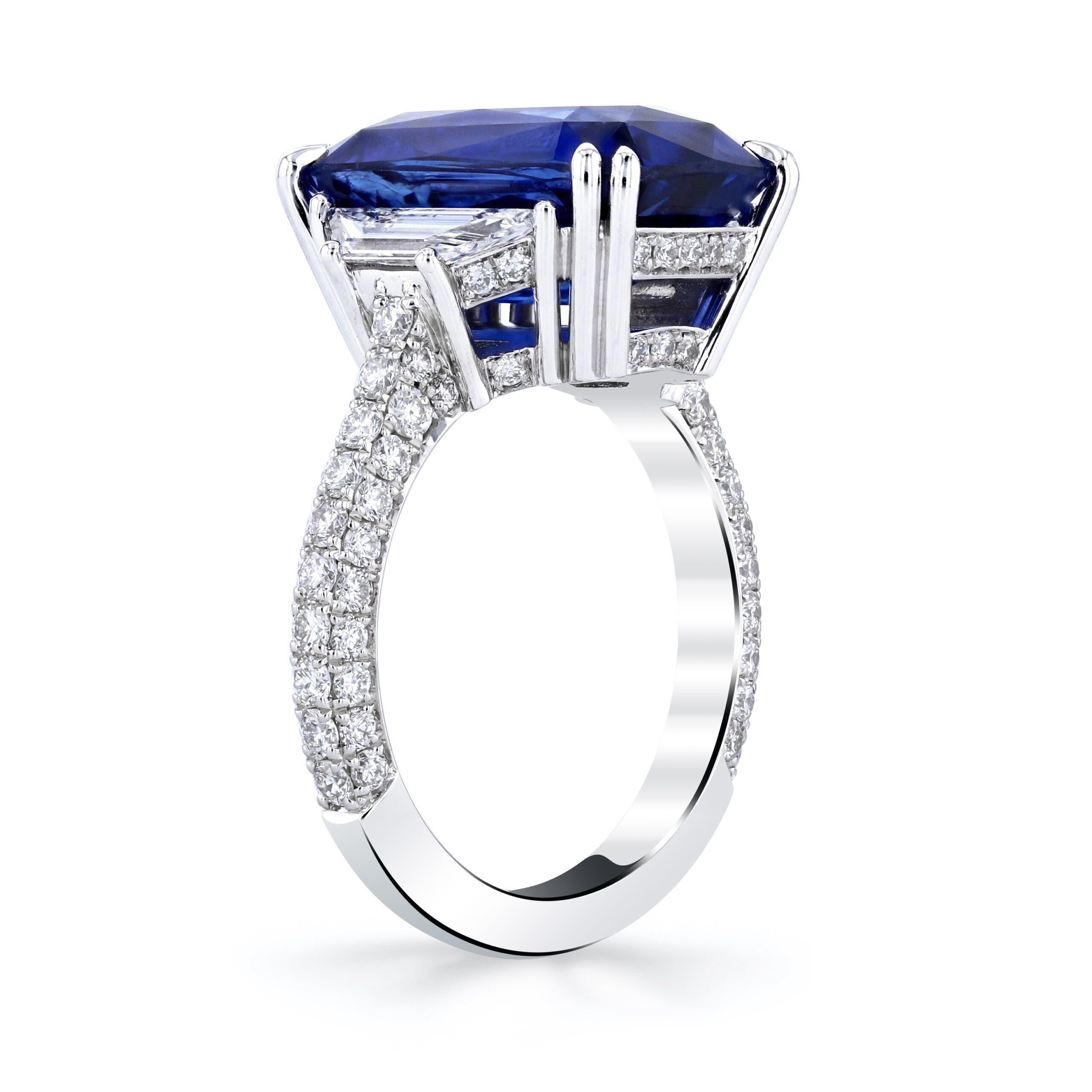 Elongated cushion cut blue sapphire and diamond three-stone ring in platinum – Underwood Jewelers