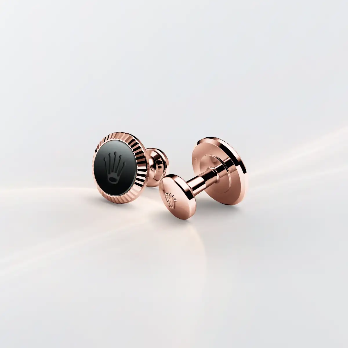 rolex ‘Fluted’ cufflinks in Everose gold and ceramic, A1035 at underwood jewelers