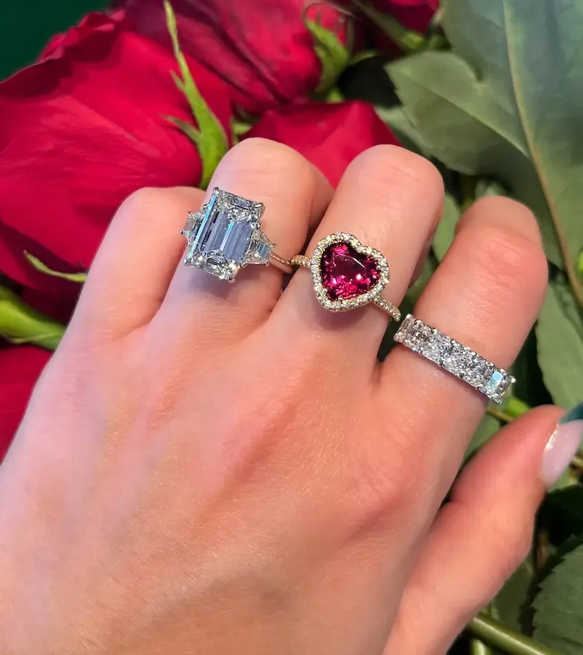 model wearing 3 different Valentine's Day diamond rings from Underwood Jewelers in Ponte Vedra