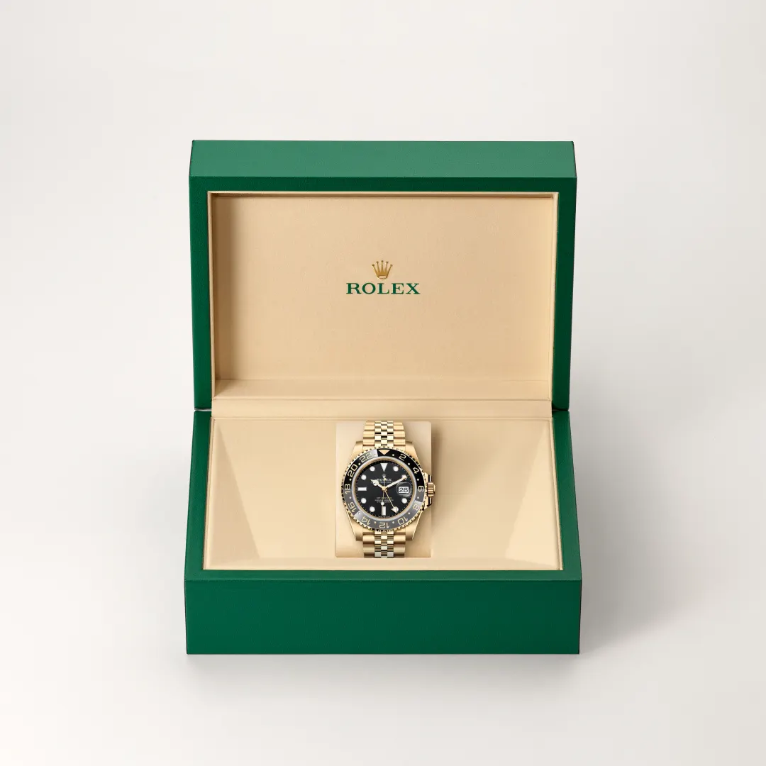 rolex GMT-Master II in 18 kt yellow gold, M126718GRNR-0001 - underwood jewelers