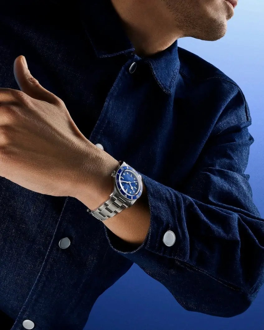 model wearing TUDOR Black Bay 54 watch on wrist