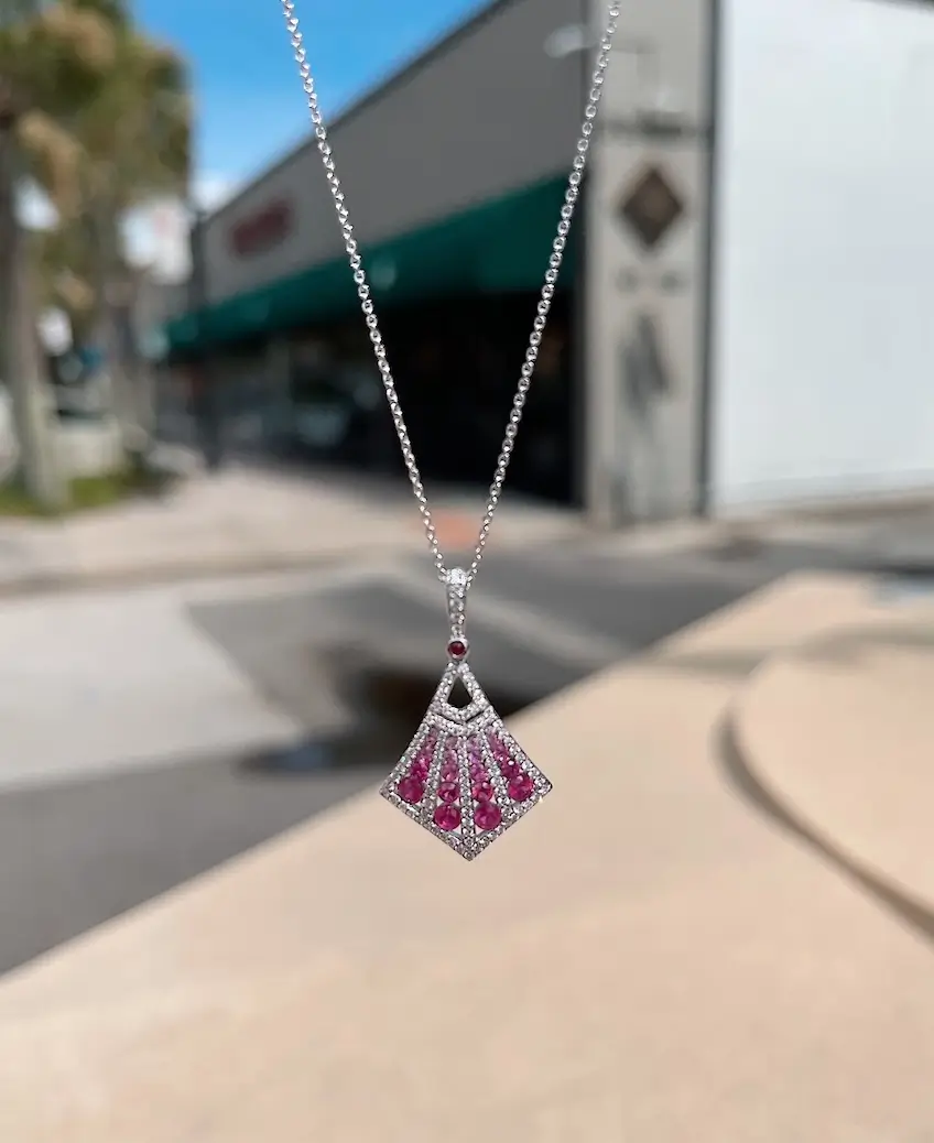 Art Deco Ruby & Diamond Necklace pictured outside Underwood Jewelers