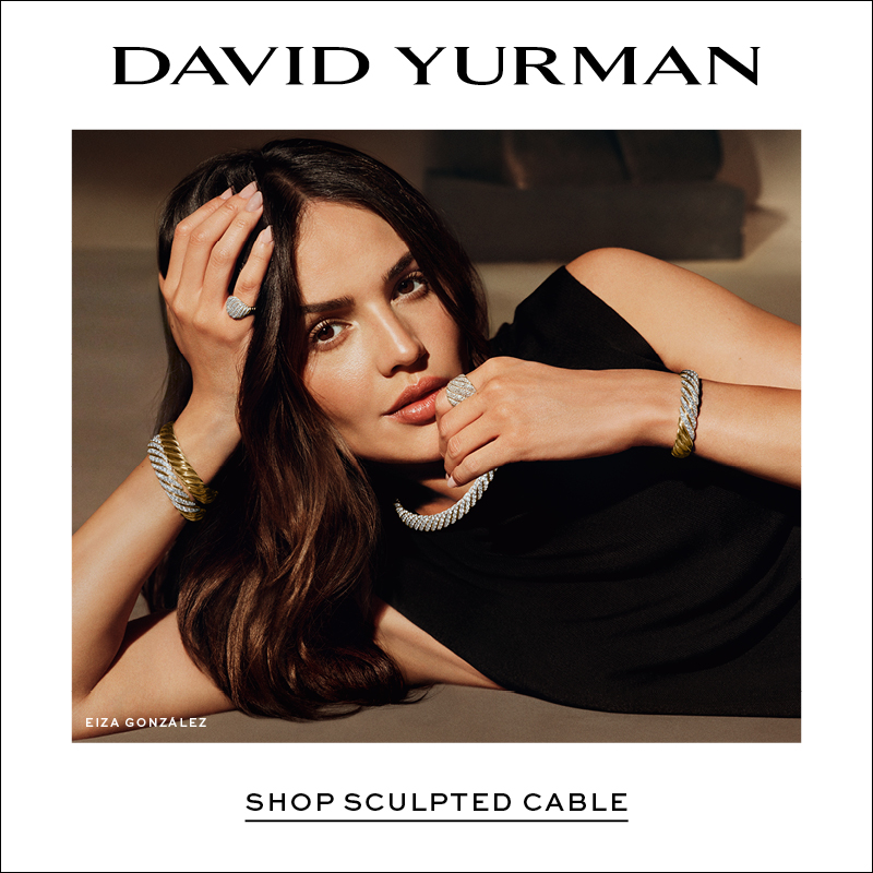 Eliza González wearing David Yurman Sculpted Cable jewelry, including mixed-metal diamond bracelets, rings and a necklace, styled with a black dress.